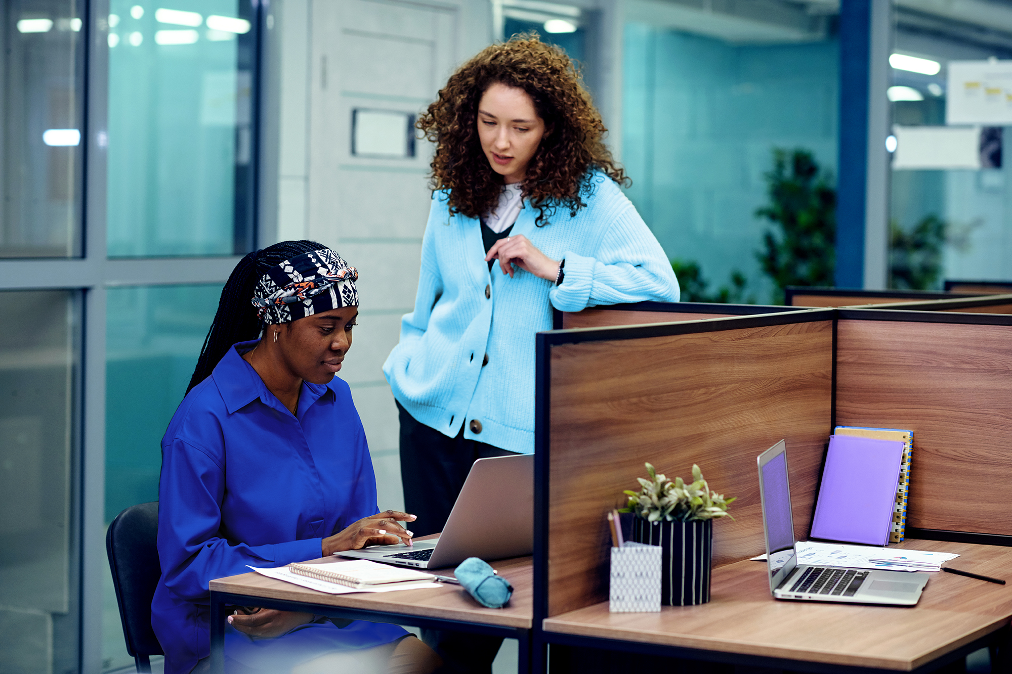 Professionals reviewing financial close software powered by AI to streamline accounting processes