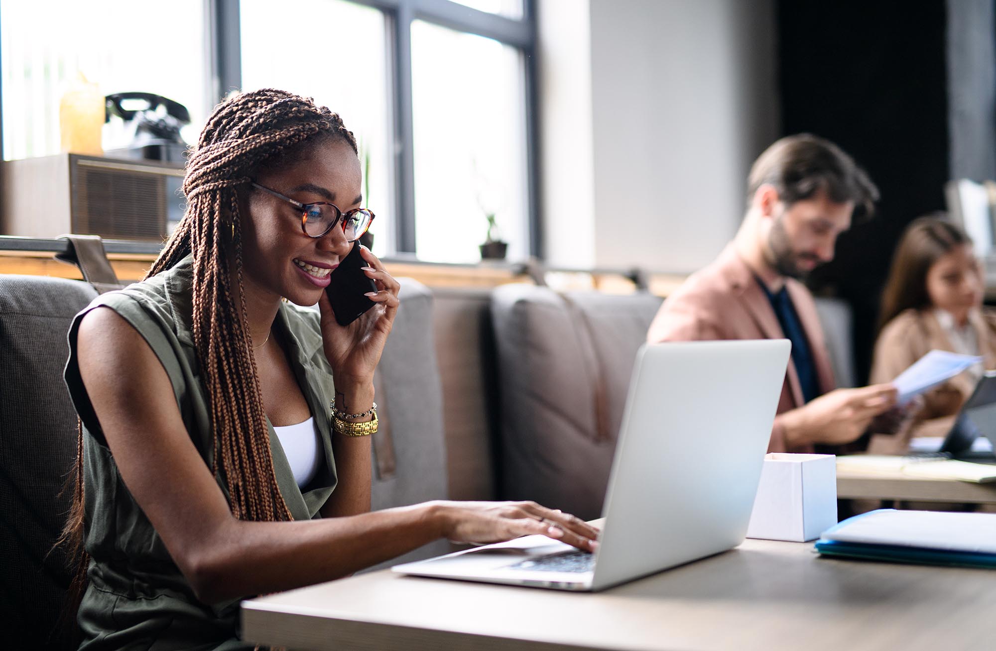 Professional working from home on laptop to manage accounting journal entries and financial close tasks